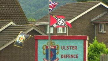 Nazi and UK terrorist banners erected by extremist unionists or British separatists in Ireland fly over the town of Carrickfergus